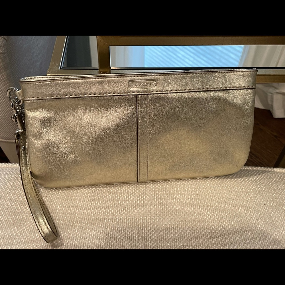 Coach clutch / wristlet : gold leather